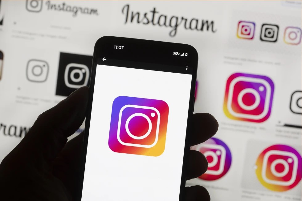 The Instagram logo is seen on a cell phone.