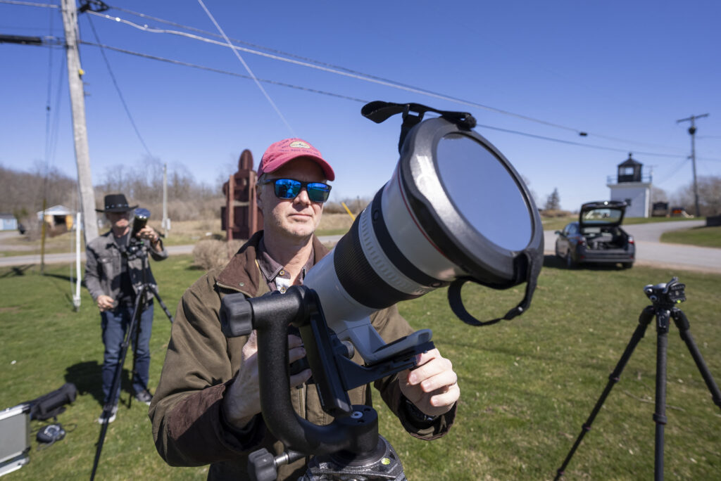 NASA Solar eclipse in US: What do scientists hope to learn from it? IN Photo is John Bills testing his camera equipment on the even of a total solar eclipse across North America.