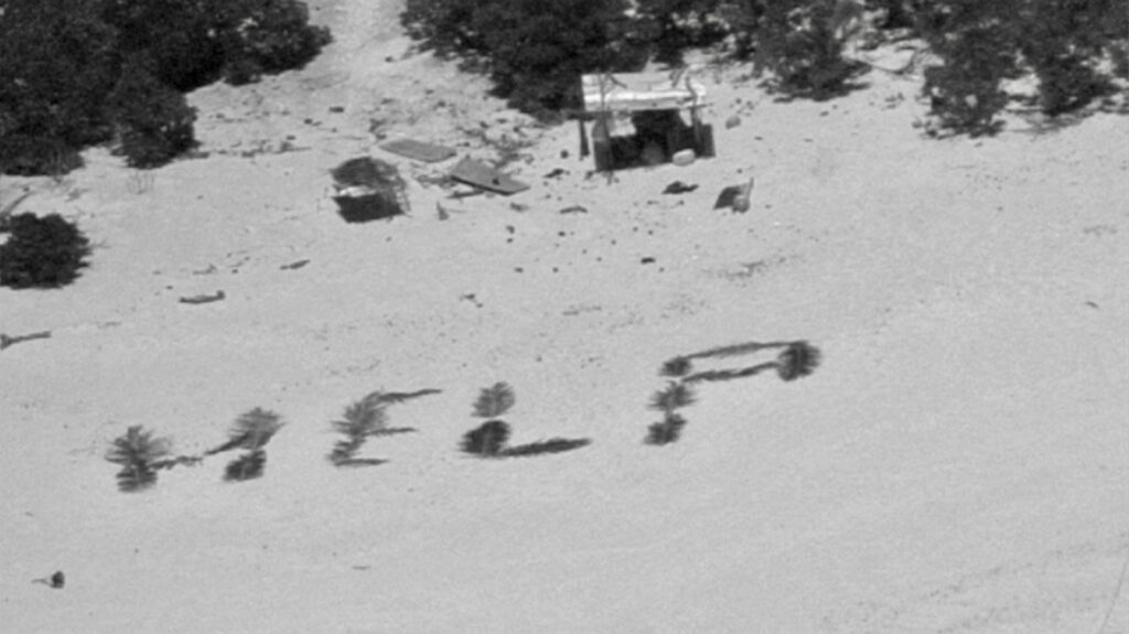 'HELP' written in palm fronds lands rescue for Pacific castaways. This image obtained from the US Coast Guard on April 11, 2024 shows a "Help" sign on the beach made with palm leaves by three mariners stranded on Pikelot Atoll, Yap State, Federated States of Micronesia. | Photo by US COAST GUARD / AFP