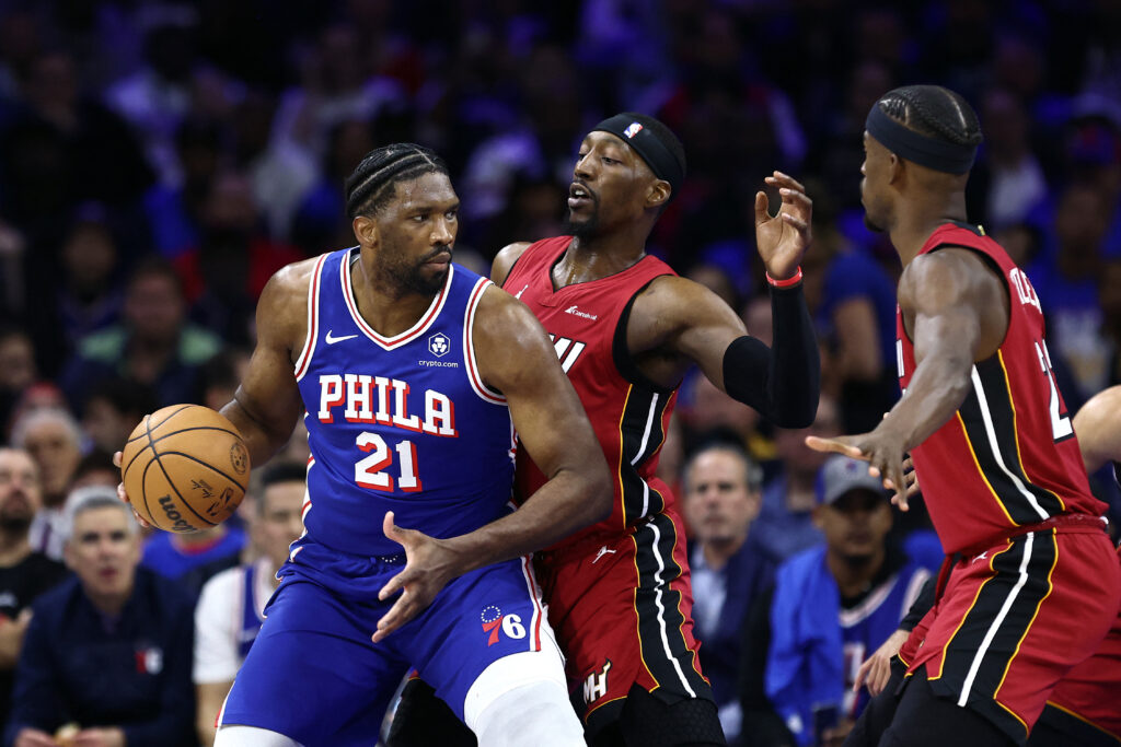 NBA: Sixers rally to beat Heat, book NBA playoff clash with Knicks. Joel Embiid #21 of the Philadelphia 76ers is guarded by Bam Adebayo #13 of the Miami Heat during the third quarter during the Eastern Conference Play-In Tournament at the Wells Fargo Center on April 17, 2024 in Philadelphia, Pennsylvania. | Getty Images via AFP