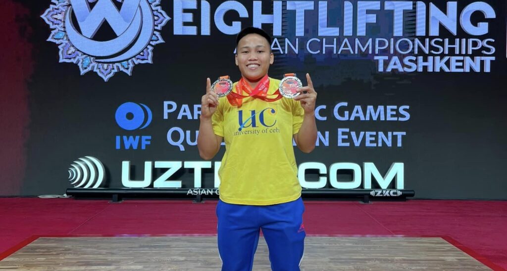 Ando punches second Olympics ticket as Hidilyn Diaz-Naranjo misses. Elreen Ando during the Asian Weightlifting Championships. | Photo from Ando's Facebook page