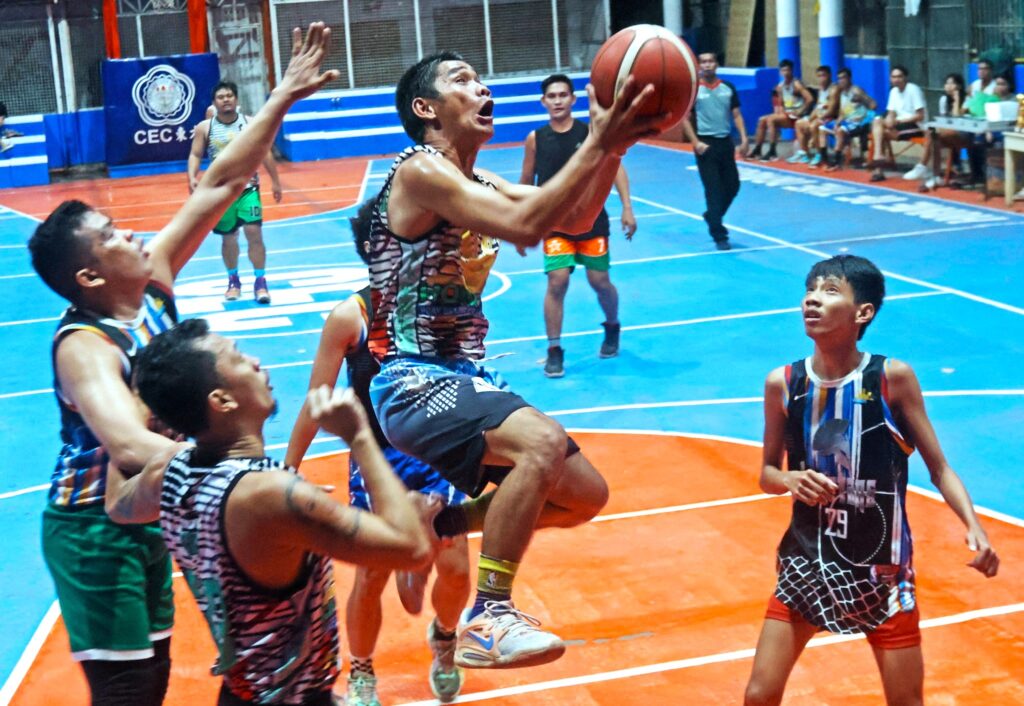 Randall Cup Summer hoopla kicks off on Saturday. A player from Homeboys floats for a layup in one of their Randall Cup Summer League game. | Photo from Sugbuanong Kodaker