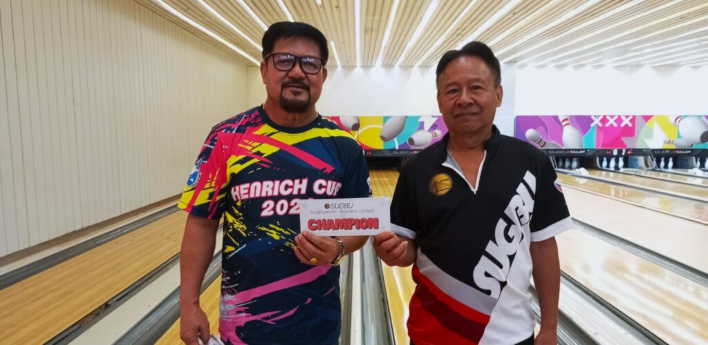 SUGBU doubles bowling tilt: Bueno-Ranido duo rules. In photo are Nestor Ranido (left) and Manny Bueno (right) receiving their cash prize during the awarding ceremony. | Contributed photo
