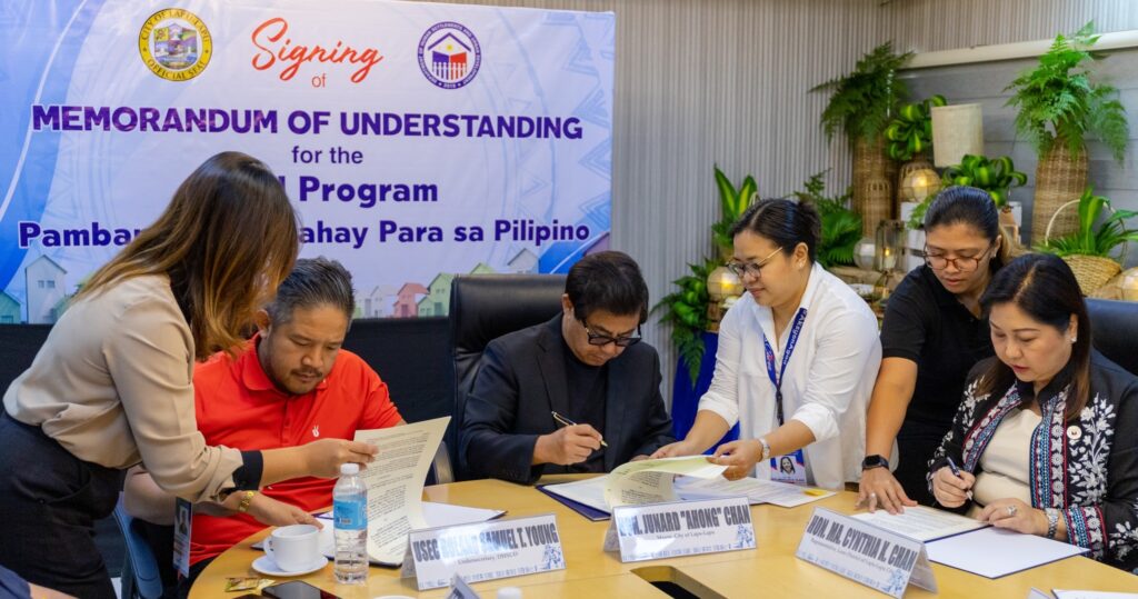 Lapu-Lapu City Mayor Junard Chan inks a memorandum of understanding with the Department of Human Settlement and Urban Development (DHSUD) for a socialized housing project in the city. | Futch Anthony Inso