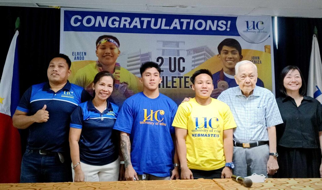 Ando, Ceniza receive P200,000 each from UC for qualifying in Paris OlympicsUC weightlifting coach Christopher Bureros (from left), UC athletic director Jessica Honoridez, John Febuar Ceniza, Elreen Ando, UC chairman Lawyer Augusto W. Go, and UC Chancellor Candice Gotianuy. | By Glendale Rosal