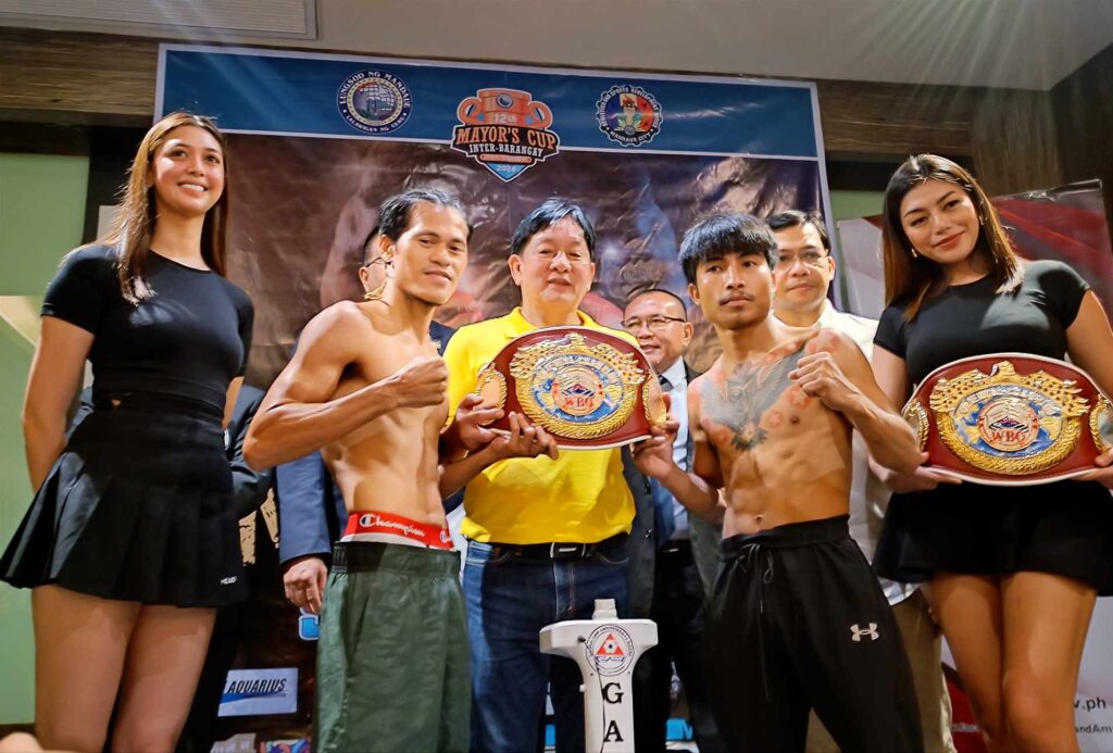 Mandaue boxing: All set for Labor Day WBO regional title bouts. IN PHOTO are Vic Saludar (left) and Sanchai Yotboon (right) pose for the camera along with Mandaue City Vice Mayor Glenn Bercede. | Glendale Rosal