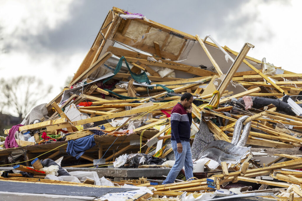 Nebraska and Iowa tornadoes collapse buildings and level homes . Gopala Penmetsa walks past his house after it was leveled by a tornado near Omaha, Neb., on Friday, April 26, 2024. (Chris Machian/Omaha World-Herald via AP)