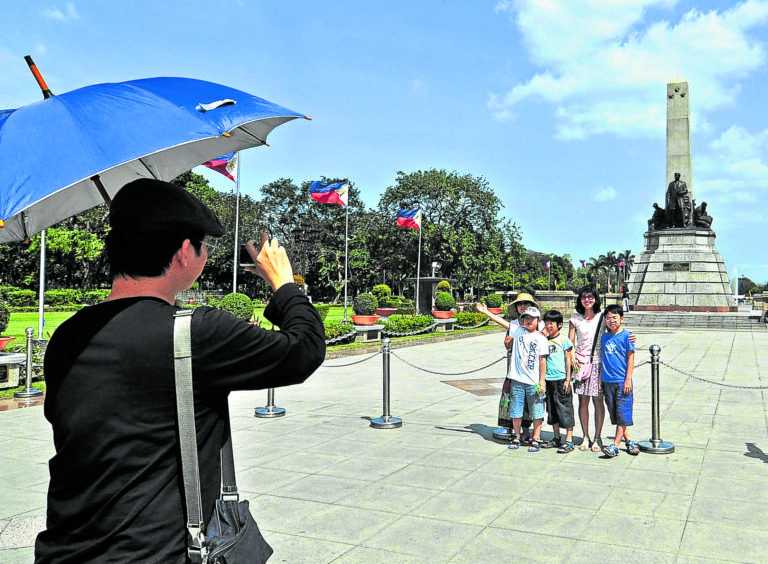 South Koreans, such as these tourists at Rizal Park in this photo taken Jan. 30, 2011, accounted for more than half of the two million foreign travelers who arrived from January to March this year. 