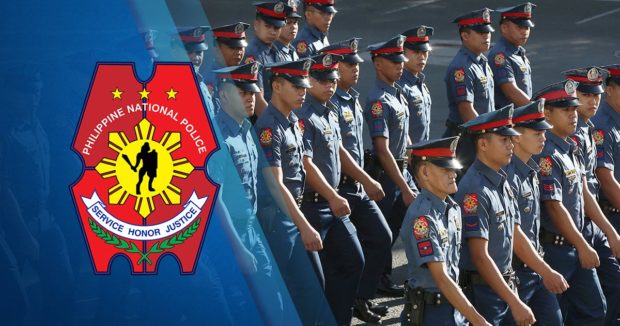 Police officers march at the Philippine National Police grounds in Camp Crame in Quezon City.