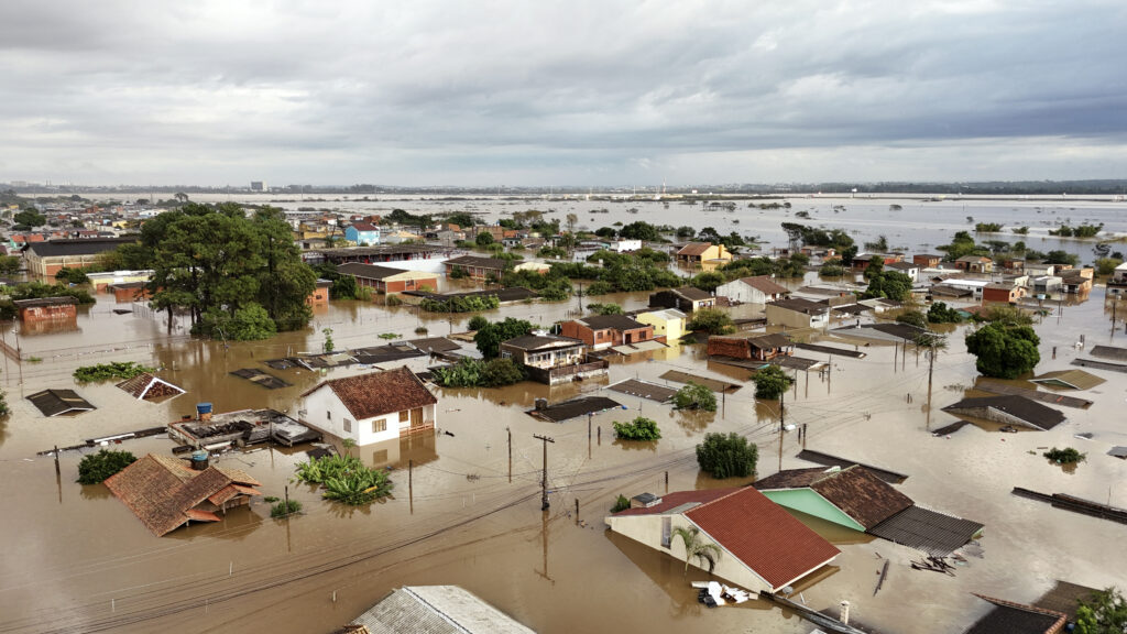 Floods in Brazil kill 75 people in 7 days, 103 others missing. Aerial view of flooded streets at the Sarandi neighborhood in Porto Alegre, Rio Grande do Sul state, Brazil on May 5, 2024. | Photo by Carlos Fabal / AFP