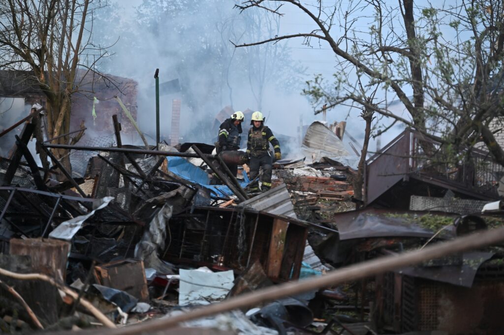 China sending ‘lethal aid’ to Russia for Ukraine war, says UK defense minister. Photo shows Firefighters clearing debris from private houses in the suburbs of Kharkiv destroyed by the attack of Russian drones, on May 21, 2024, amid the Russian invasion in Ukraine. (Photo by SERGEY BOBOK / AFP)