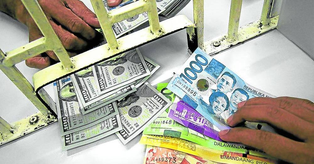 Peso slides to 58 to $1 for first time in almost 2 years