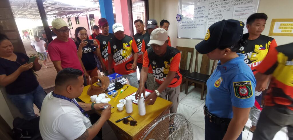 Workers in Brgy Talima, Lapu-Lapu City submit their urine samples on May 27, 2024.