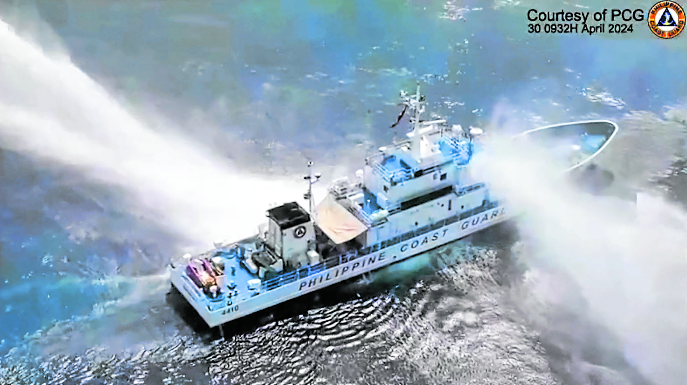 A frame grab from video footage released by the Philippine Coast Guard shows its ship, the BRP Bagacay, being hit by water cannon from Chinese coast guard vessels near the Chinese-controlled Scarborough Shoal in the West Philippine Sea. Also hit on its way to the shoal was the BRP Bankaw of the Bureau of Fisheries and Aquatic Resources. AGENCE FRANCE-PRESSE