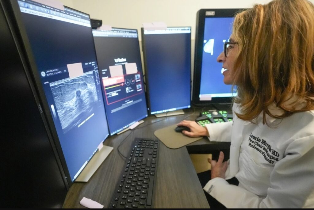 Dr. Laurie Margolies demonstrates the Koios DS Smart Ultrasound software, Wednesday, May 8, 2024, at Mount Sinai hospital in New York. The breast imaging AI is used to get a second opinion on mammography ultrasounds. “I will tell patients, ‘I looked at it, and the computer looked at it, and we both agree,’” Margolies said. “Hearing me say that we both agree, I think that gives the patient an even greater level of confidence."