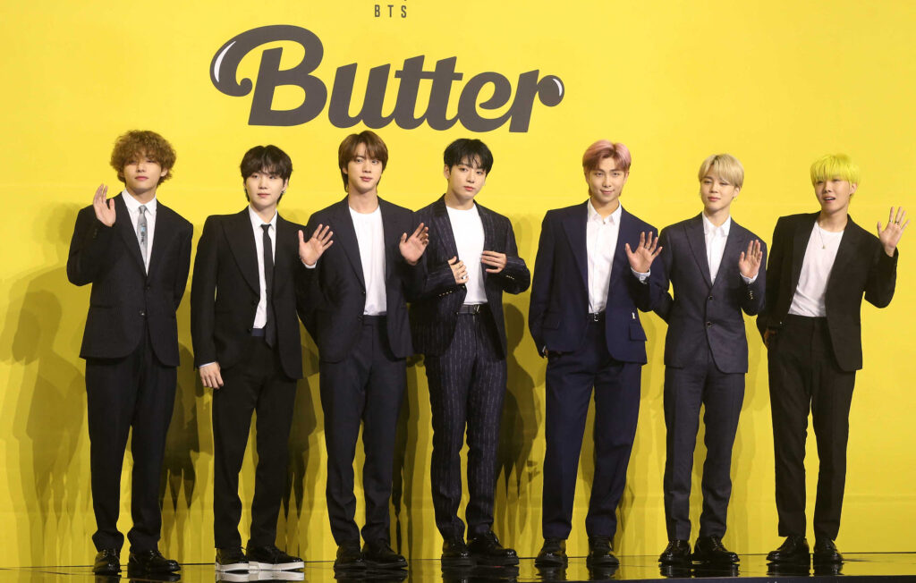 BTS music vs trash: 2 Koreas restart bizarre psychological warfare. IN PHOTO are Members of South Korean K-pop boy band BTS pose for photographs during a press conference to promote their new single album 'Butter' in Seoul on May 21, 2021. | AFP FILE PHOTO