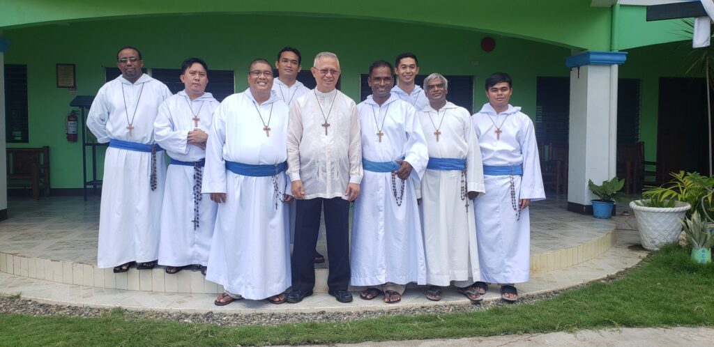 Brothers of the Missionaries of the Poor, with Cebu Archbishop Jose Palma pose for a photo with an event held in 2022.