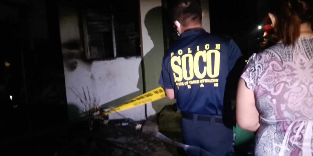 LOOK: Talamban fire kills 10-year-old boy. Photo shows scene of the crime operatives (SOCO) members processing the area where a 10-year-old boy was killed by the past 2 a.m. fire. | Paul Lauro