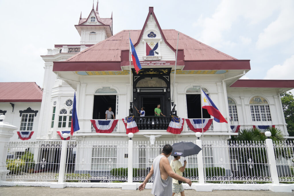 Independence Day: Growing diaspora means plenty of celebration worldwide. Workers prepare the Emilio Aguinaldo Shrine where Philippine independence from Spain was proclaimed in Kawit, Cavite province, Philippines on Monday, June 10, 2024. (AP Photo/Aaron Favila)