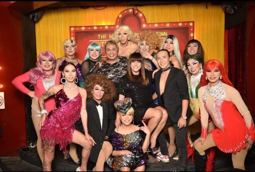 Performers at the 8th Avenue Comedy Bar pose for a picture together on stage. | Contributed photo