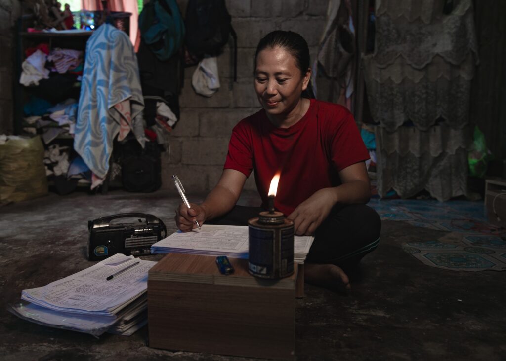 For years, she struggled to do work with just a kerosene lamp as a source of light.