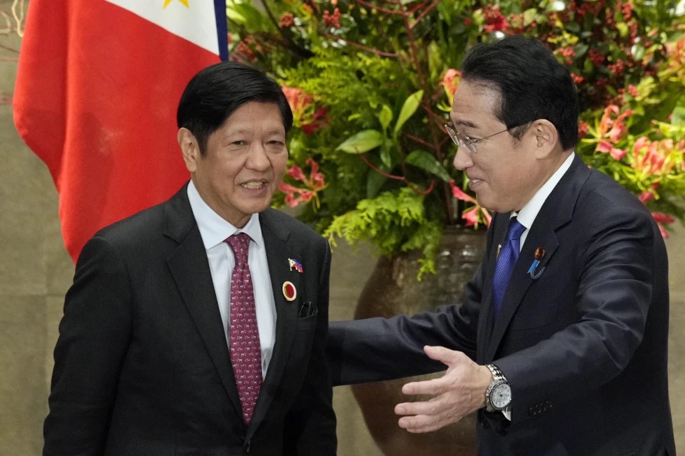 Japan’s Prime Minister Fumio Kishida, right, greets Philippines’ President Ferdinand Marcos Jr., prior to their bilateral meeting at the prime minister’s official residence in Tokyo, Sunday, Dec. 17, 2023, on the sidelines of the Commemorative Summit for the 50th Year of ASEAN-Japan Friendship and Cooperation. Top defense and foreign affairs officials of Japan and the Philippines will meet in Manila July 2024, to strengthen strategic ties and discuss regional concerns, the Department of Foreign Affairs said Friday June 28, 2024 at a time of escalating alarm over China’s increasingly aggressive actions in the disputed South China Sea.