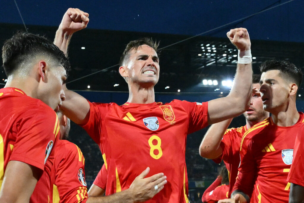 EURO 2024: Spain could have beaten Georgia 9-1, says coach. Spain's midfielder #08 Fabian Ruiz celebrates with teammates after scoring his team's second goal during the UEFA Euro 2024 round of 16 football match between Spain and Georgia at the Cologne Stadium in Cologne on June 30, 2024. Spain beat Georgia, 4-1. | AFP