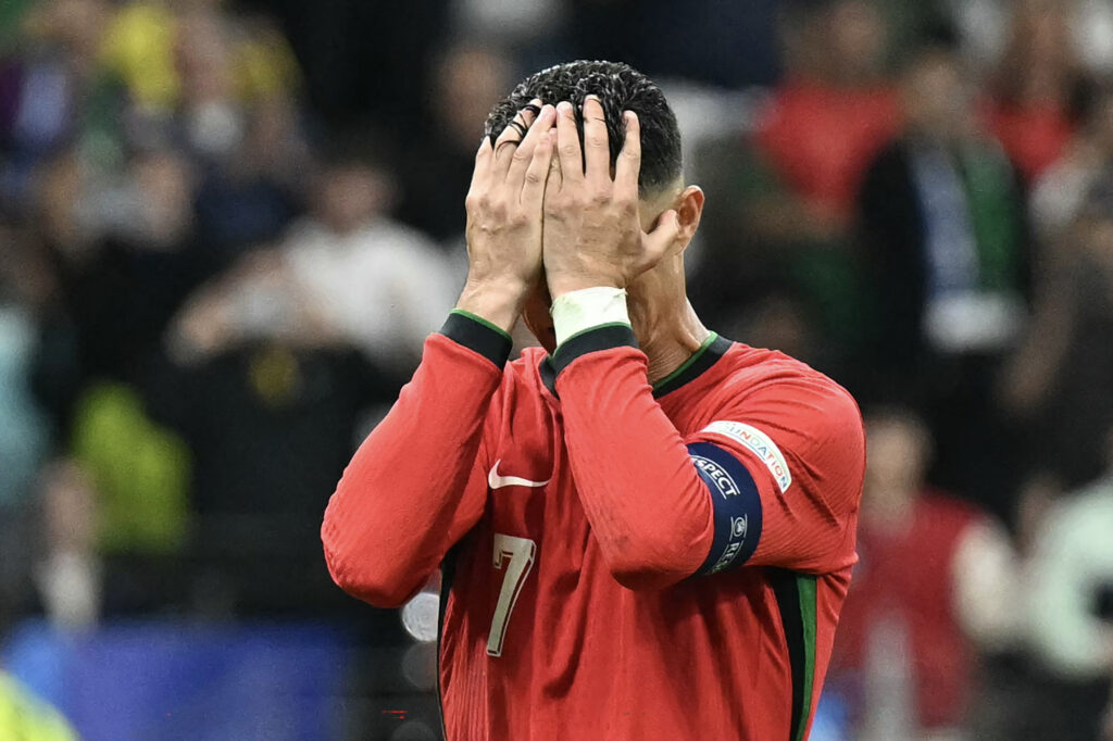 Euro 2024: Ronaldo's tears turn to cheers as Portugal survives: Portugal's forward #07 Cristiano Ronaldo reacts after failing to score a penalty kick during the UEFA Euro 2024 round of 16 football match between Portugal and Slovenia at the Frankfurt Arena in Frankfurt am Main on July 1, 2024. |Photo by PATRICIA DE MELO MOREIRA / AFP