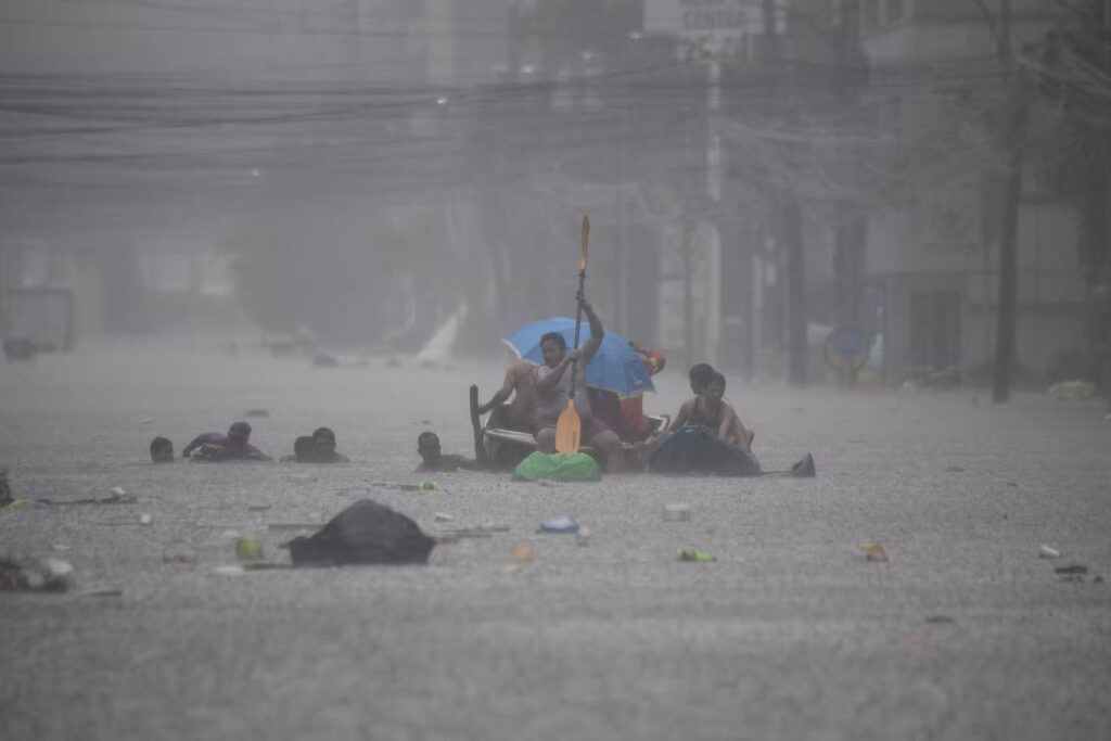 Typhoon Carina: Metro Manila under state of calamity. Rescuers paddle their boats along a flooded street in Manila on July 24, 2024 amid heavy rains brought by Typhoon Gaemi. Relentless rain drenched the northern Philippines on July 24, triggering flooding in Manila and landslides in mountainous regions as Typhoon Gaemi intensified the seasonal monsoon. (Photo by Ted ALJIBE / AFP)Read more: https://newsinfo.inquirer.net/1964987/metro-manila-now-under-state-of-calamity-due-to-typhoon-carina#ixzz8gvDouh2Z Rescuers paddle their boats along a flooded street in Manila on July 24, 2024 amid heavy rains brought by Typhoon Gaemi. Relentless rain drenched the northern Philippines on July 24, triggering flooding in Manila and landslides in mountainous regions as Typhoon Gaemi intensified the seasonal monsoon. (Photo by Ted ALJIBE / AFP)