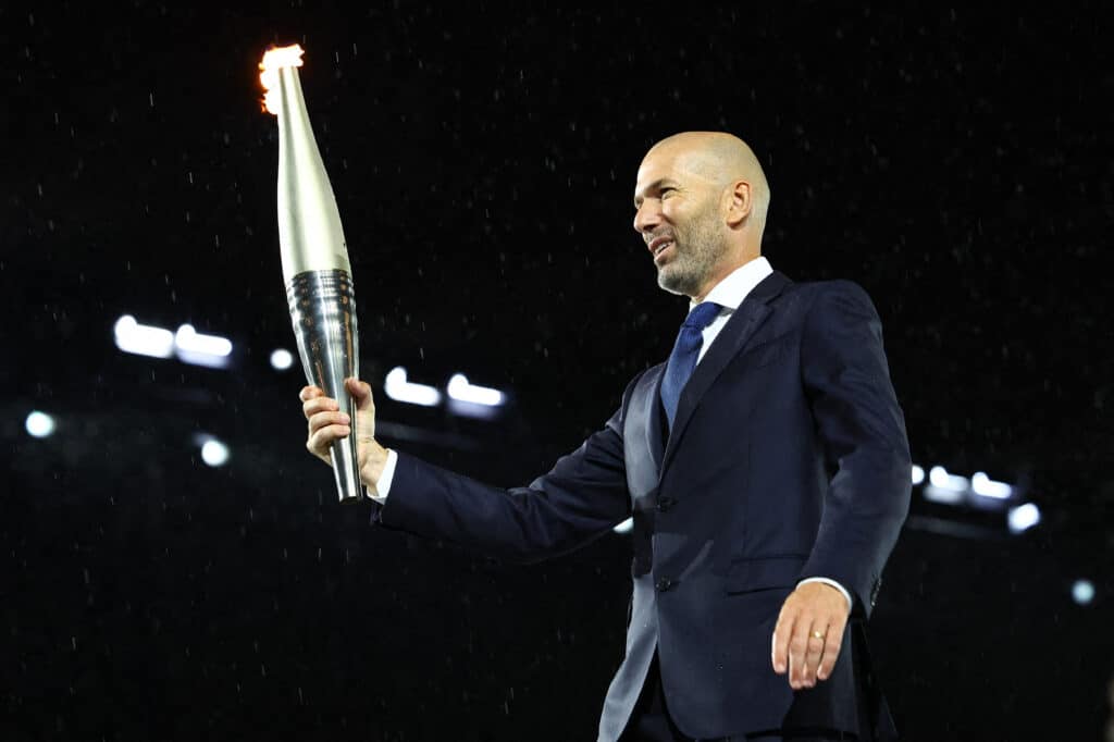 Paris 2024 Olympics - Opening Ceremony - Paris, France - July 26, 2024. Torchbearer Zinedine Zidane is seen during the opening ceremony. (Photo by Stephanie Lecocq / POOL / AFP)