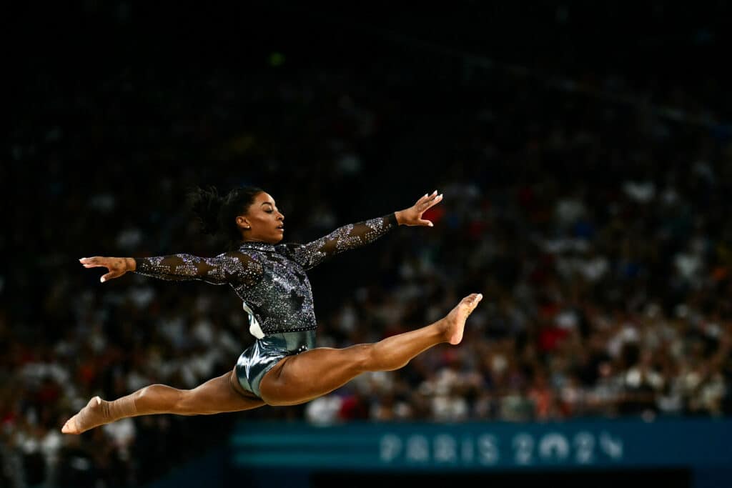 Paris Olympics: Italy's Martinenghi wins 100m breaststroke thriller. US' Simone Biles competes in the floor exercise event of the artistic gymnastics women's qualification during the Paris 2024 Olympic Games at the Bercy Arena in Paris, on July 28, 2024. (Photo by Loic VENANCE / AFP)