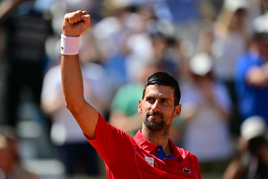 Serbia's Novak Djokovic reacts to his win over Spain's Rafael Nadal in their men's singles second round tennis match in Paris Games. | AFP