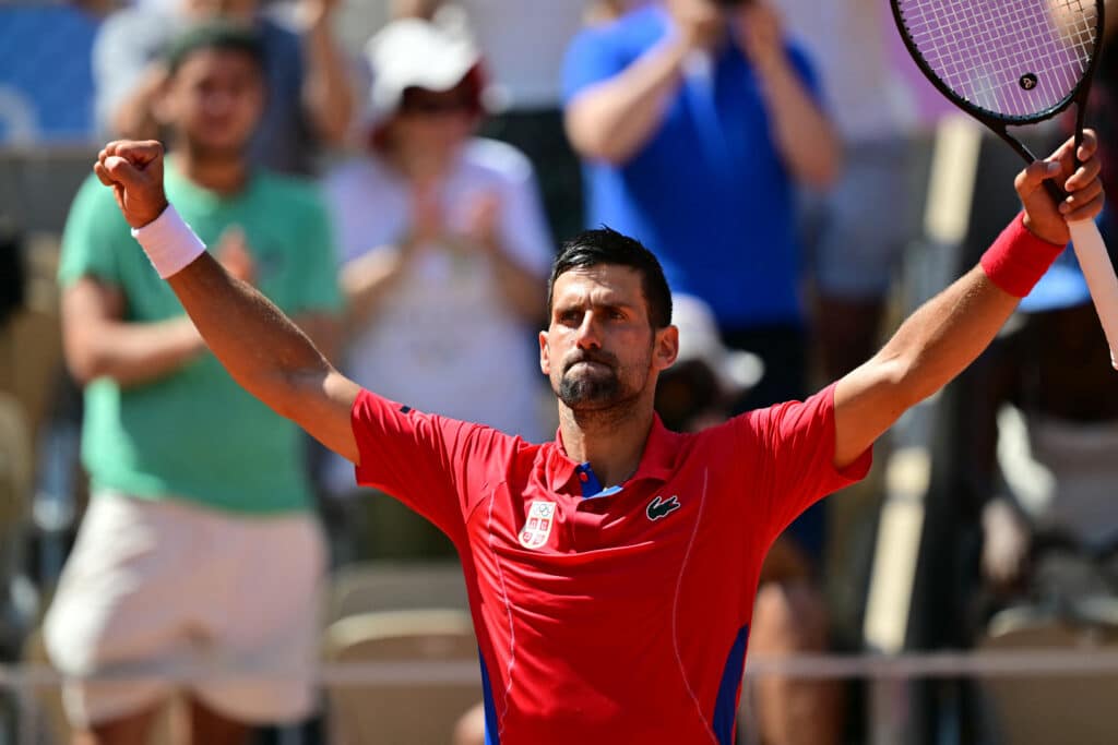 Paris Olympics: Best version of Djokovic beats diminished Nadal. Serbia's Novak Djokovic reacts to his win over Spain's Rafael Nadal in their men's singles second round tennis match on Court Philippe-Chatrier at the Roland-Garros Stadium at the Paris 2024 Olympic Games, in Paris on July 29, 2024. | Photo by Martin BERNETTI / AFP