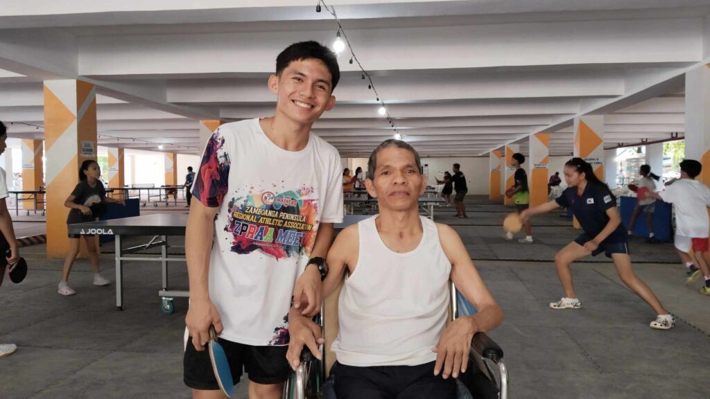 Emanuel Digamon of Zamboanga Sibugay and his son, Ralph, a silver medalist of Palarong Pambansa 2023 in Marikina City.