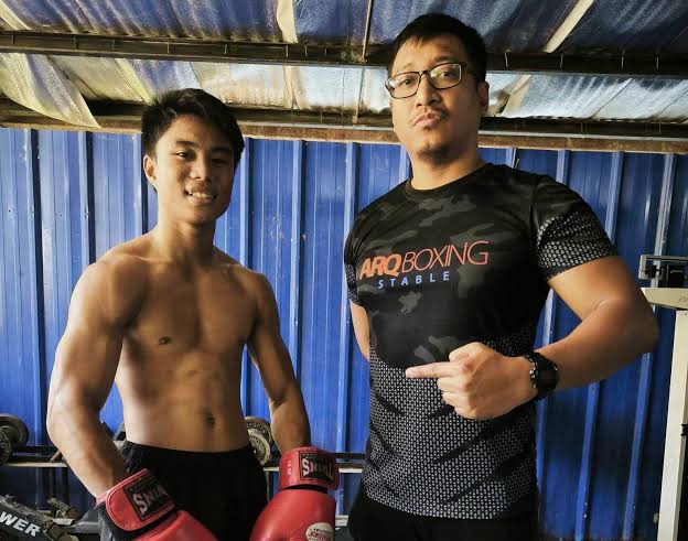 ARQ Sports still optimistic for boxing prospect who lost in Japan. Yerroge Gura (left) and Roger Justine Potot (right). | Contributed photo