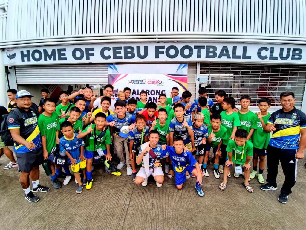 PFF lauds DBTC, FEU for ruling Palarong Pambansa football. DBTC Greywolves players and coaches pose for a photo after winning the gold medal in Palaro’s elementary football. | CDN file photo