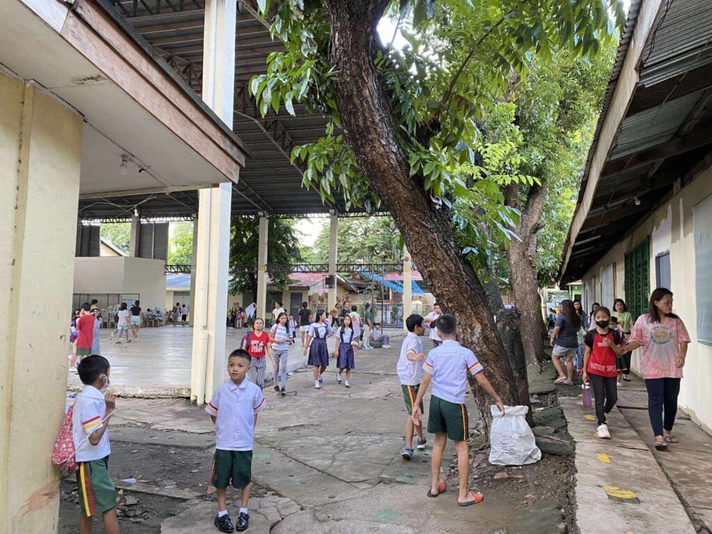 First day of school jitters. Students find their classrooms as they attend the first day of the school year. | Paul Lauro