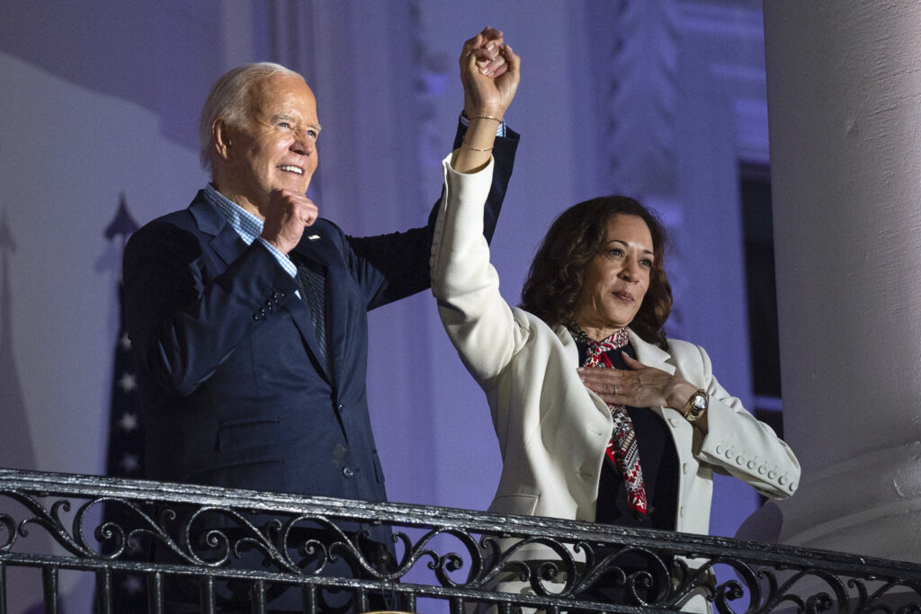 Biden passing torch to Harris: Anchovy pizza and 1 minute warning, President Joe Biden raises the hand of Vice President Kamala Harris after viewing the Independence Day fireworks display over the National Mall from the balcony of the White House, Thursday, July 4, 2024, in Washington. |AP