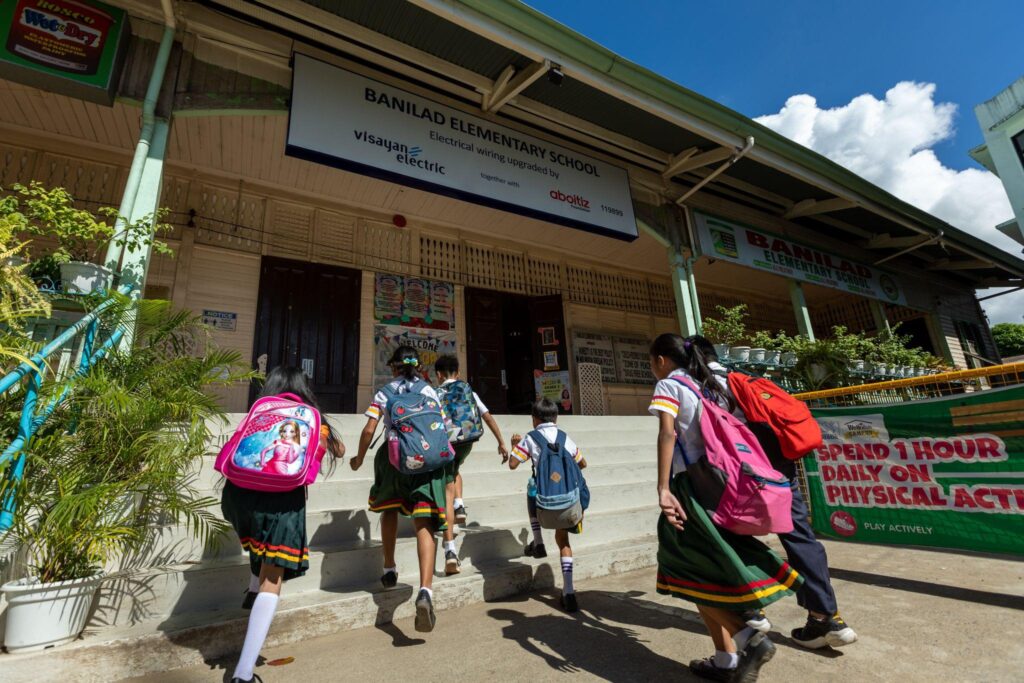 EMPOWERING EDUCATION: Students from Banilad Elementary School entering their newly rewired classrooms