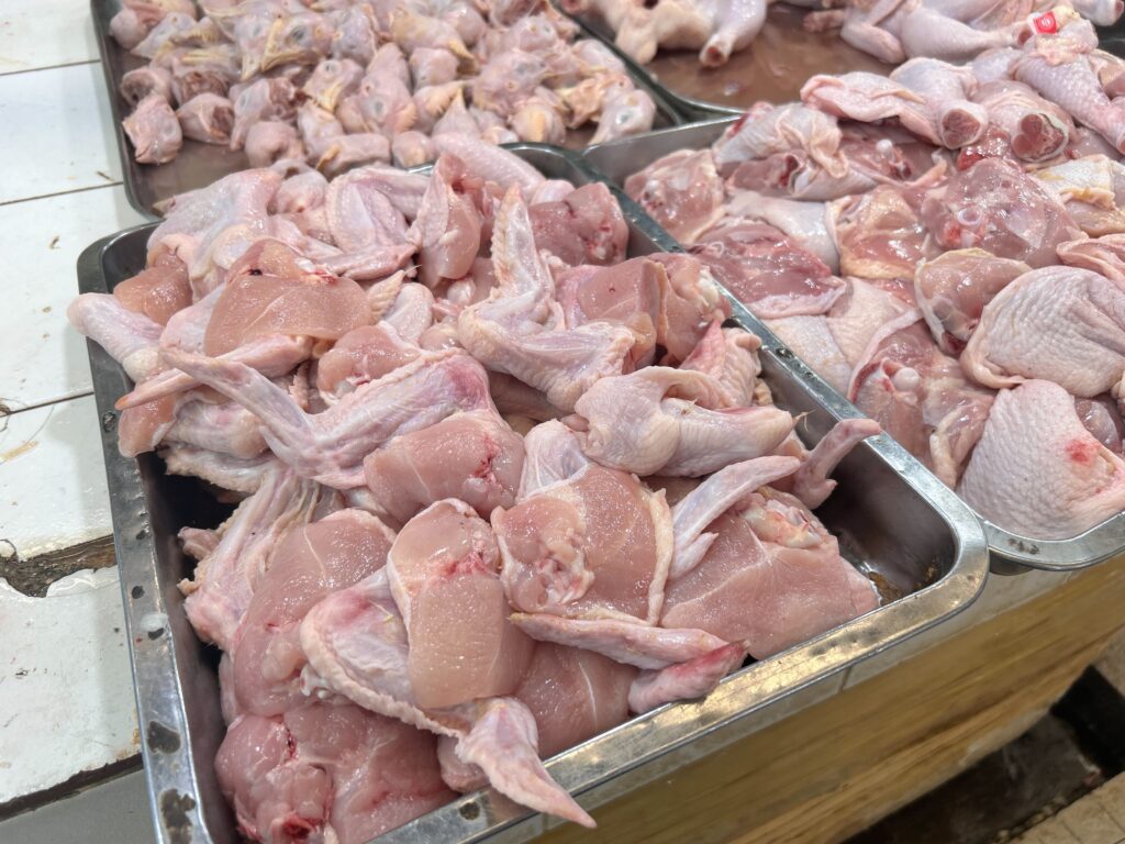 Market Prices Cebu. Fresh cuts of chicken are displayed and ready to be sold for market goers at the Carbon Public Market. | Niña Mae Oliverio