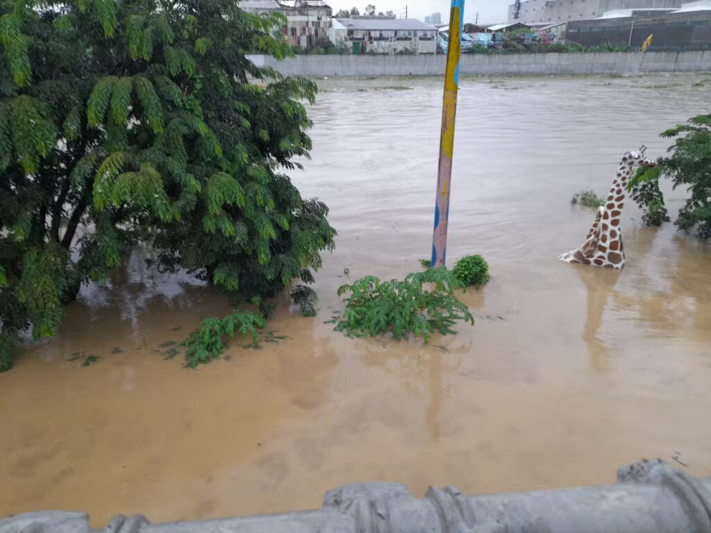 The Marikina River has reached third alarm Wednesday morning after its water level breached the 18-meter mark. (Arlene Lim / INQUIRER.net)