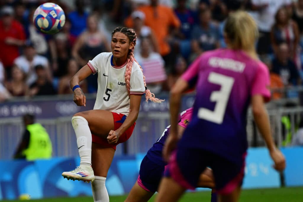 Paris Olympics: Attacking stars carry USA women to football final. US' forward #05 Trinity Rodman shoots but fails to score during the women's semi-final football match between USA and Germany during the Paris 2024 Olympic Games at the Lyon Stadium in Lyon on August 6, 2024. (Photo by Olivier CHASSIGNOLE / AFP)