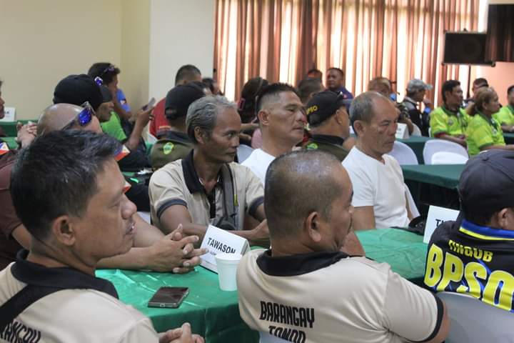 Selected barangay tanods meet with TEAM officials as they are deputized to handle illegal parking and illegal vendors. | Mary Rose Sagarino