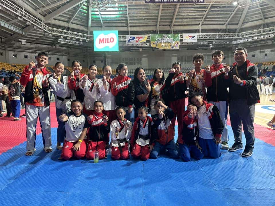 Toledo team shines at national taekwondo tournament in Manila. In photo are Toledo Taekwondo Center jins and coaches pose for a group photo during the 2024 National Milo Taekwondo Championships. | Facebook photo