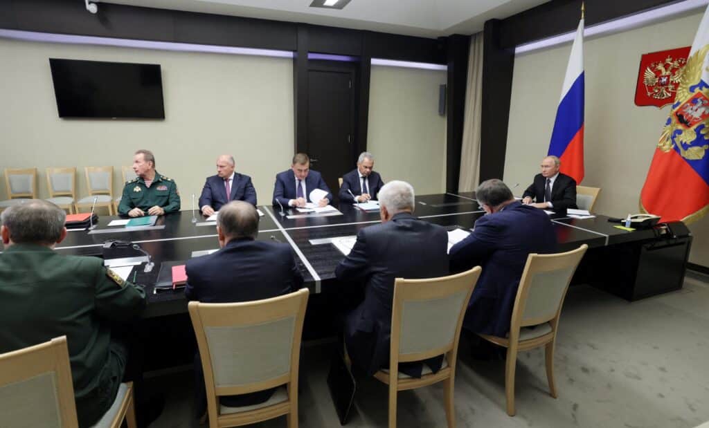 In this pool photograph distributed by Russian state owned agency Sputnik, Russia's President Vladimir Putin (C) chairs a meeting regarding the situation in the Kursk region, in his residence in Novo-Ogaryovo outside Moscow, on August 12, 2024. - The governor of Russia's Kursk region where Ukraine has launched an incursion told Russian President Vladimir Putin that 28 settlements with a population of around 2,000 people are controlled by Ukrainian troops on August 12, 2024. (Photo by Gavriil GRIGOROV / POOL / AFP) / EDITOR'S NOTE : THIS IMAGE IS DISTRIBUTED BY RUSSIAN STATE OWNED AGENCY SPUTNIK