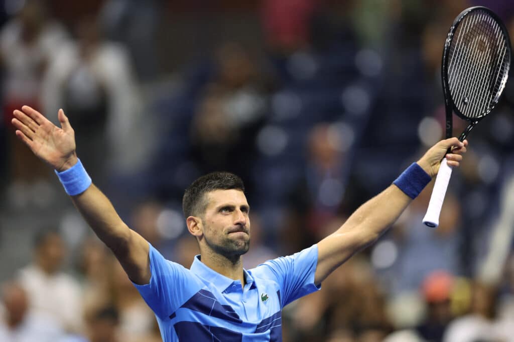 US Open: Djokovic tackles Djere, Gauff takes on Maria. In photo is Serbia's Novak Djokovic reacting after defeating Moldova's Radu Albot during their men's singles first round tennis match on day one of the US Open tennis tournament at the USTA Billie Jean King National Tennis Center in New York City, on August 26, 2024. | Photo by CHARLY TRIBALLEAU / AFP