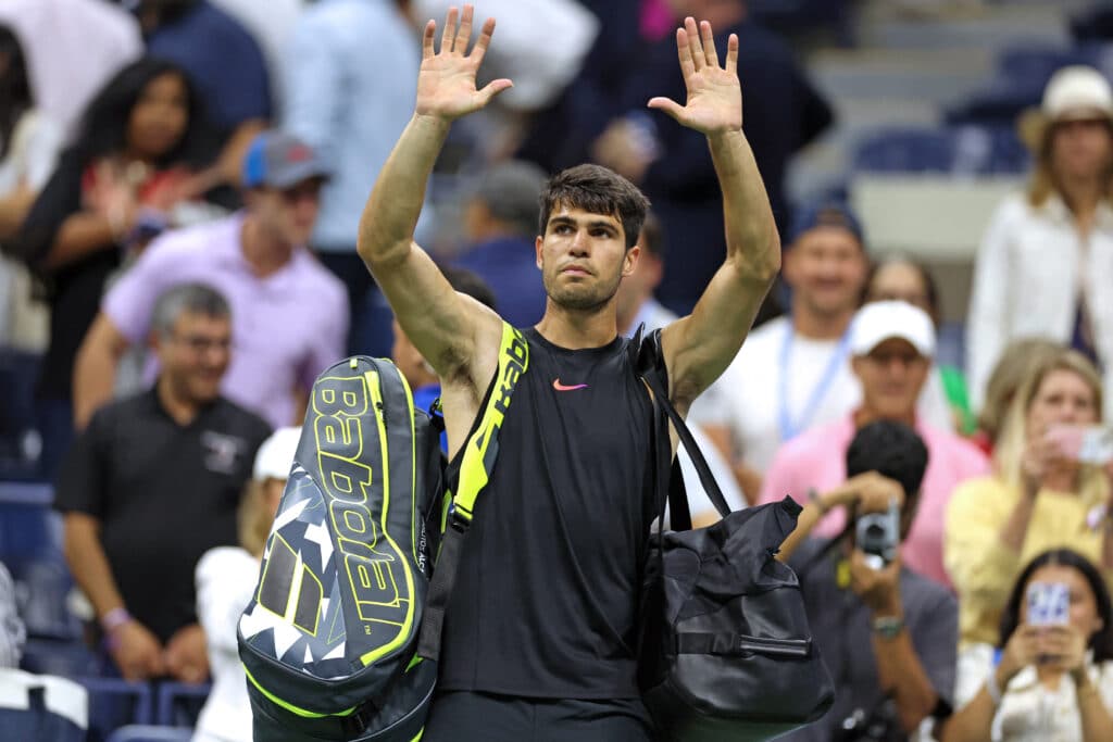 US Open: Superstars Alcaraz, Osaka crash out. In photo is Spain's Carlos Alcaraz reacting after his defeat against Netherlands' Botic van De Zandschulp during their men's singles second round tennis match on day four of the US Open tennis tournament at the USTA Billie Jean King National Tennis Center in New York City, on August 29, 2024. |Photo by CHARLY TRIBALLEAU / AFP