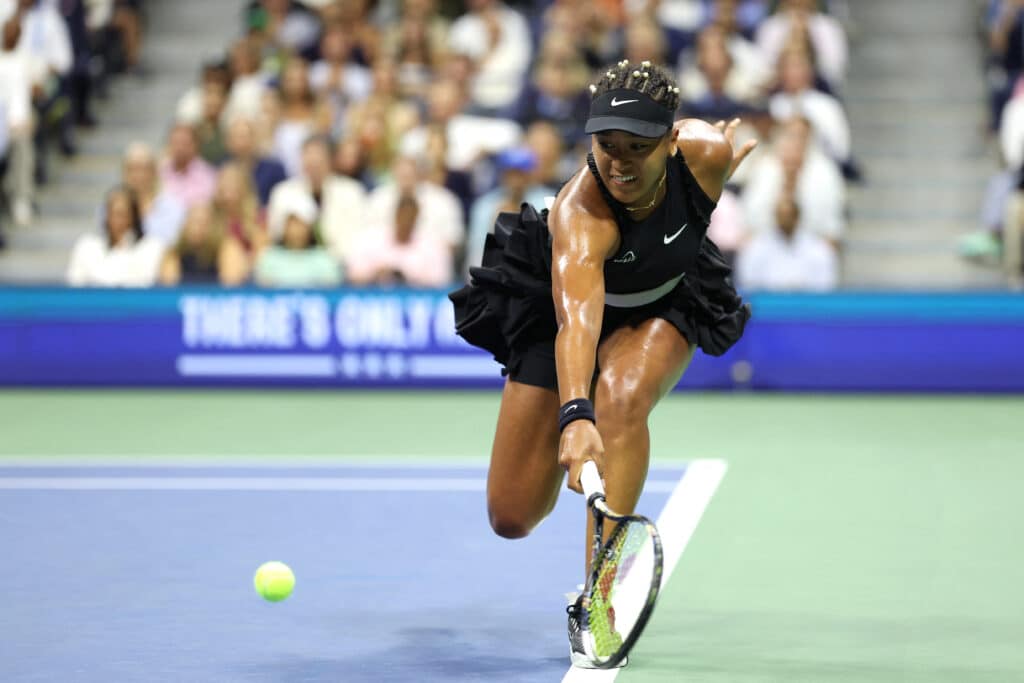 US Open: Superstars Alcaraz, Osaka crash out. In photo is Japan's Naomi Osaka returning the ball to Czech Republic's Karolina Muchova during their women's singles second round tennis match on day four of the US Open tennis tournament at the USTA Billie Jean King National Tennis Center in New York City, on August 29, 2024. | Photo by CHARLY TRIBALLEAU / AFP