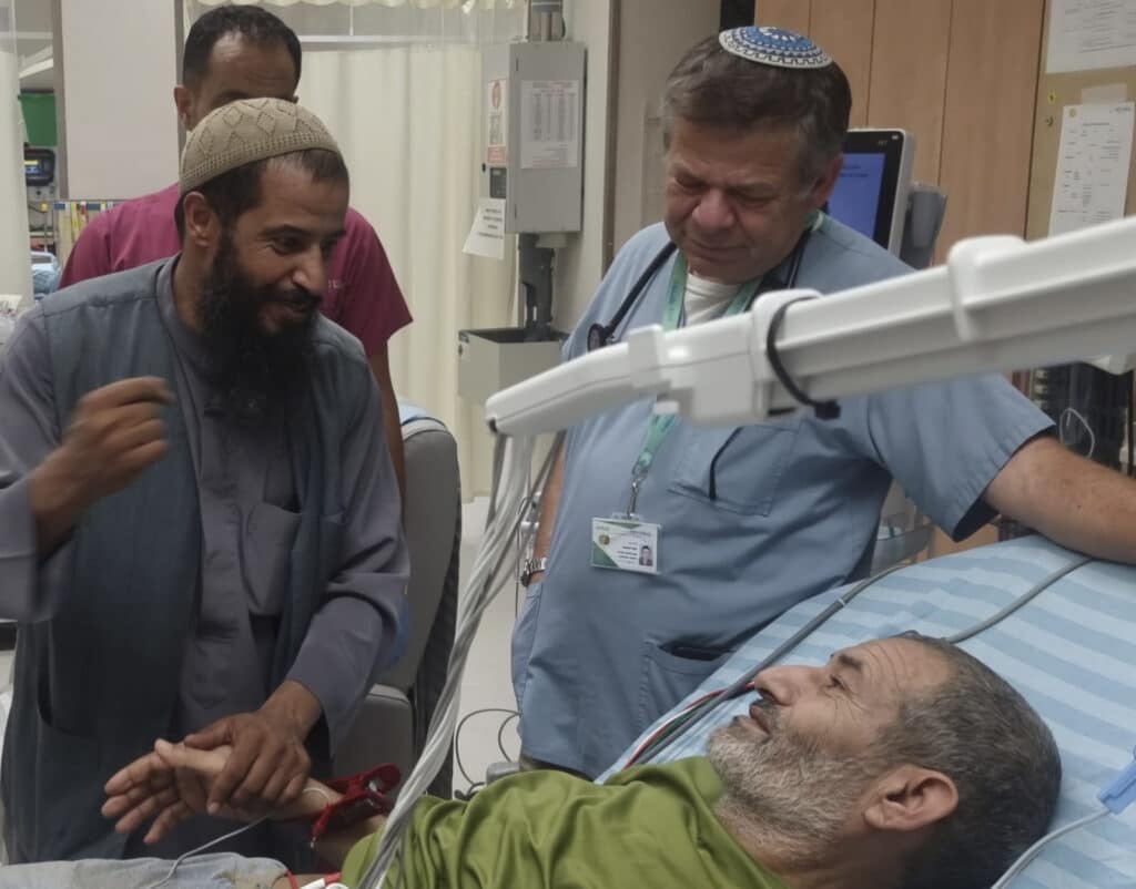 Israel says it rescued hostage from underground tunnel in Gaza. In this photo released by Soroka Medical Center on Tuesday, Aug. 27, 2024, Kaid Farhan Al-Qadi, 52, who was held hostage by Hamas militants in Gaza lies on a bed of the Soroka Medical Center in Beersheba, Israel. | Soroka Medical Center via AP