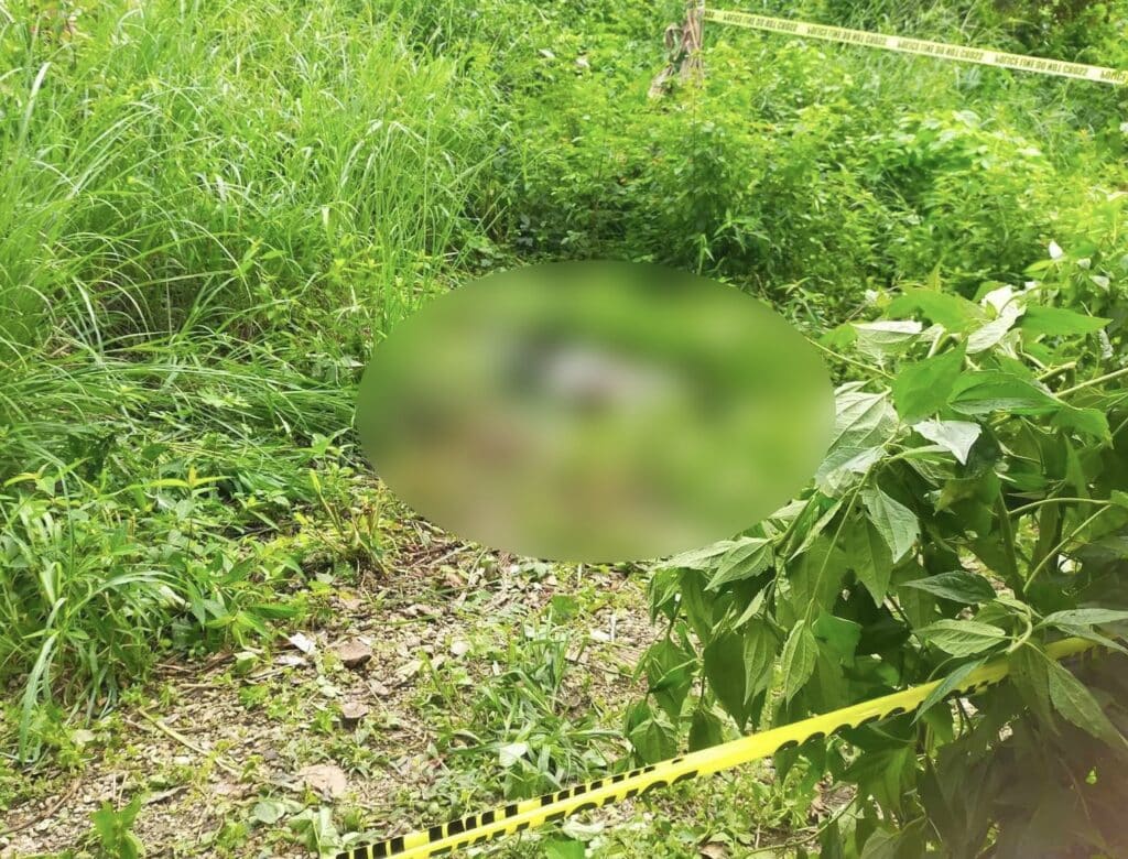 Cebu City: Murder raps readied vs man tagged in Buhisan killing. In photo is the body of a man identified as a former convict, whose body was found in Sitio Puti, Barangay Buhisan, Cebu City on Tuesday. | Futch Anthony Inso